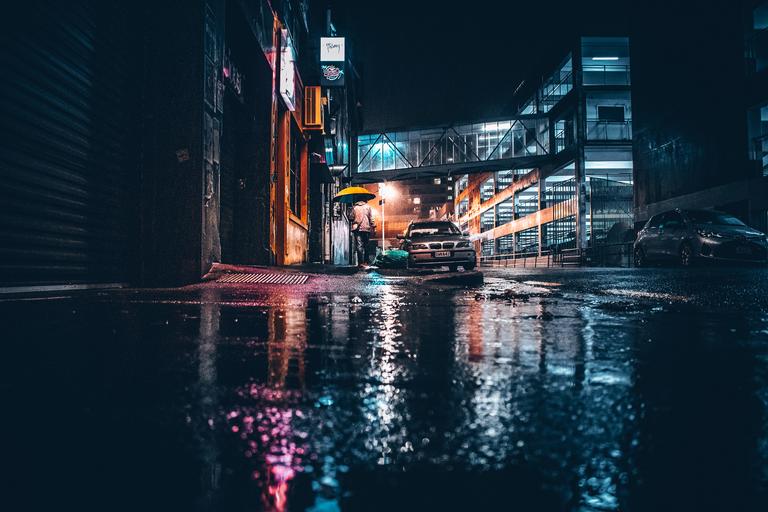A moment of loneliness when the city falls asleep in rain.